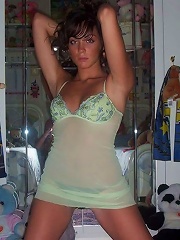 tanned brunette shows off amazing body